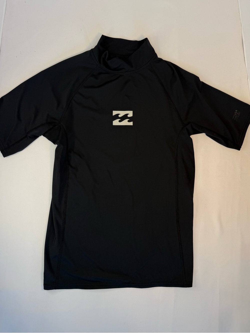Billabong children’s Black Short Sleeve Rash Guard with White Wave Logo